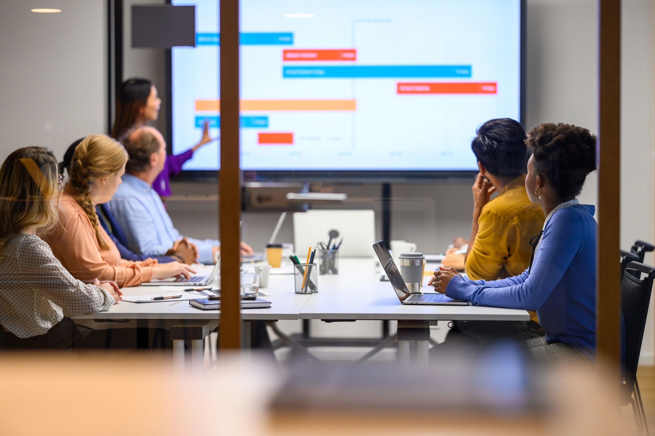 Professional presenting technology strategy in a meeting