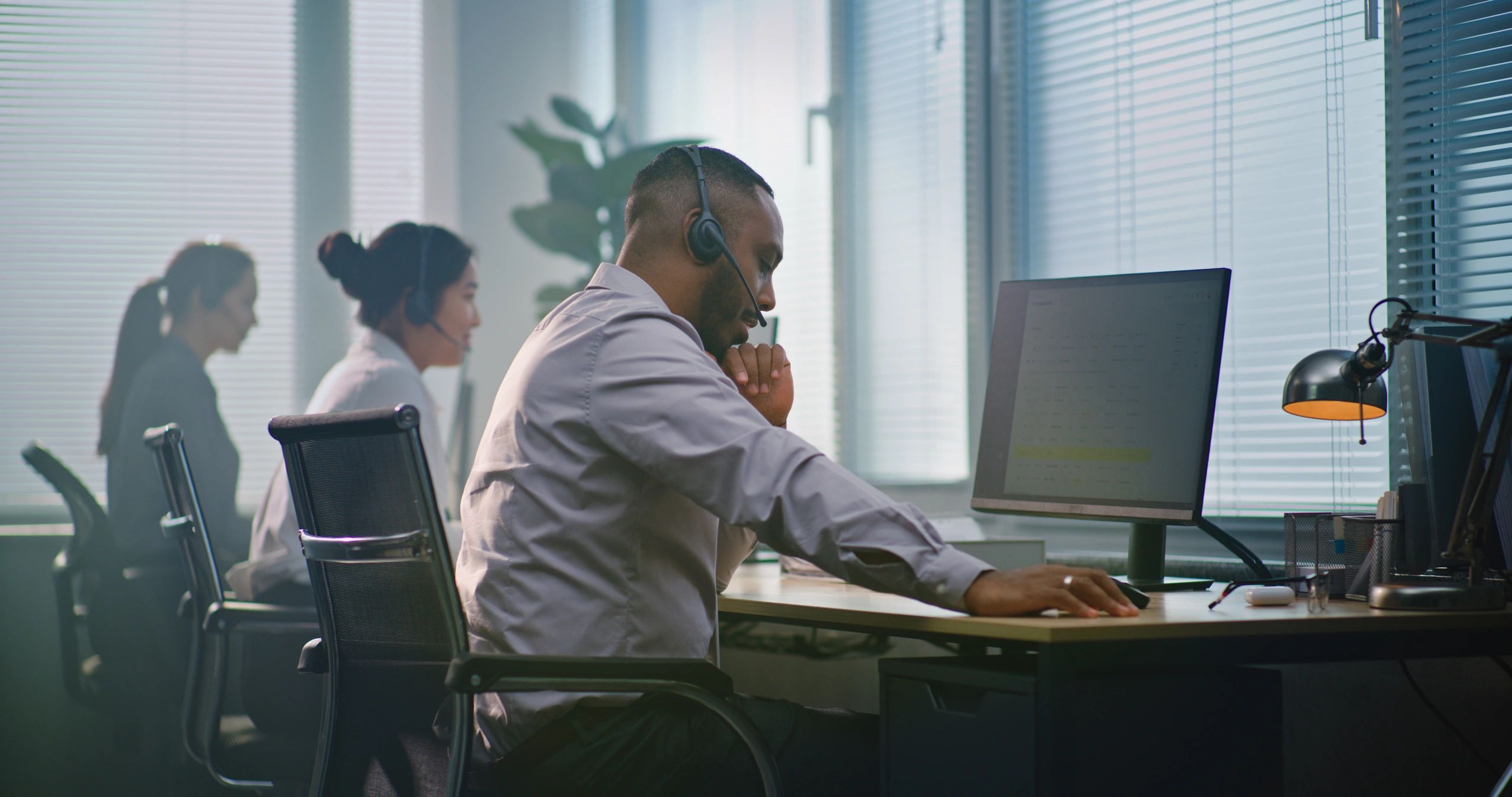 Technical support specialist working in a modern office